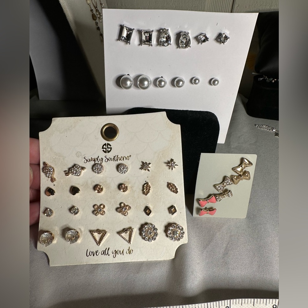 21 pair of dainty small stud style earrings